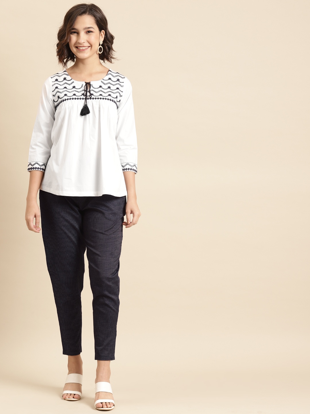 

Prakrti Women White & Navy Blue Embroidered Detail Top with Trousers