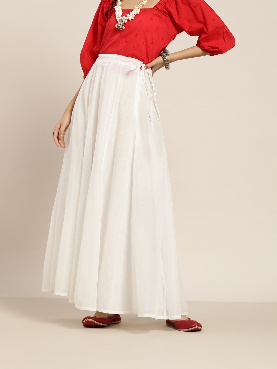 

Shae by SASSAFRAS Women White Solid Maxi Flared Skirt