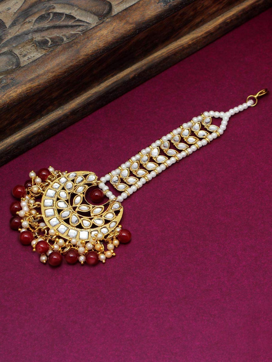 

Peora Gold Plated Maroon Kundan Handcrafted Faux Pearl Maang Tikka