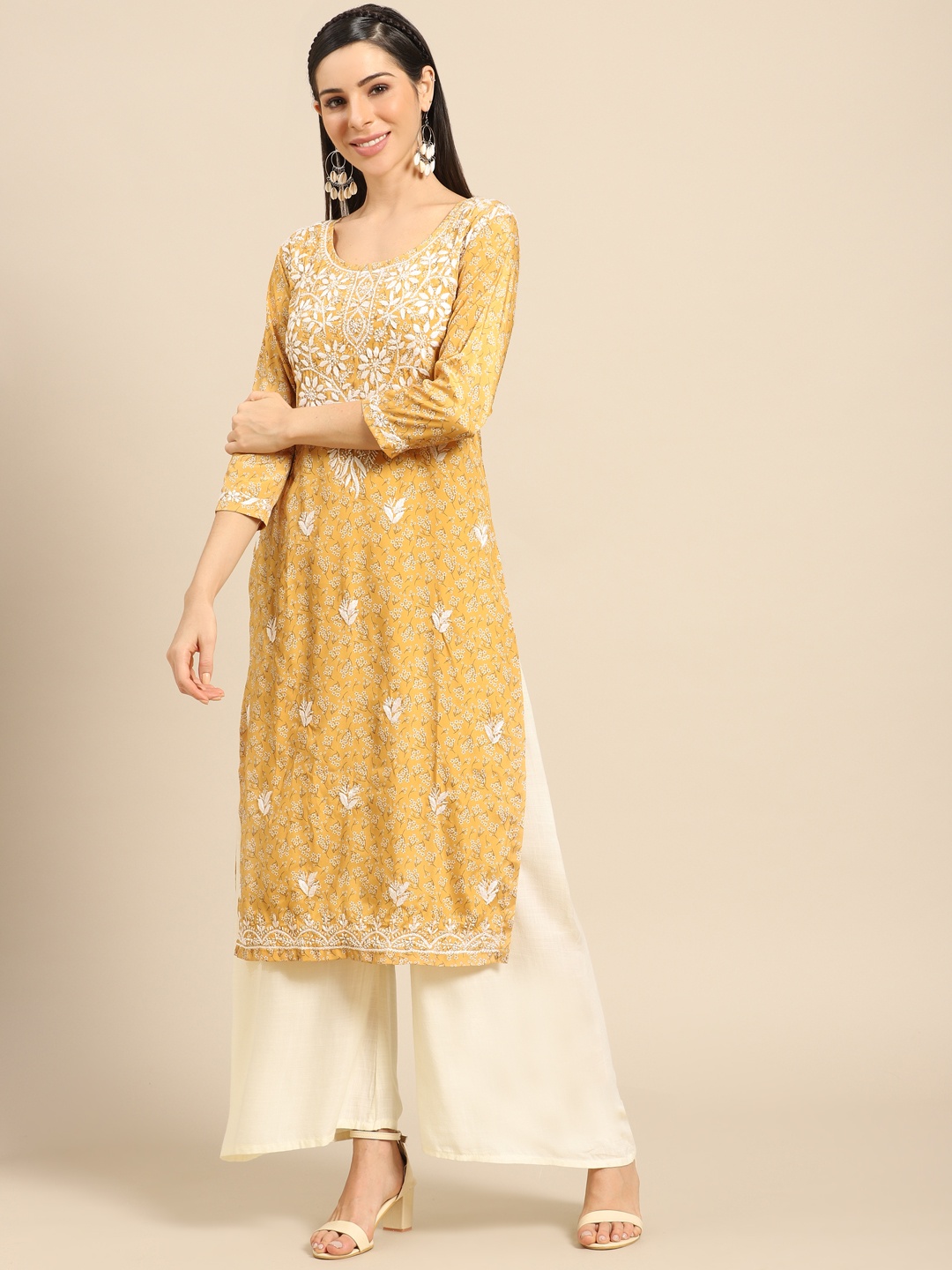 

Saadgi Women Yellow & White Ethnic Motifs Chikankari Embroidered Handloom Kurta