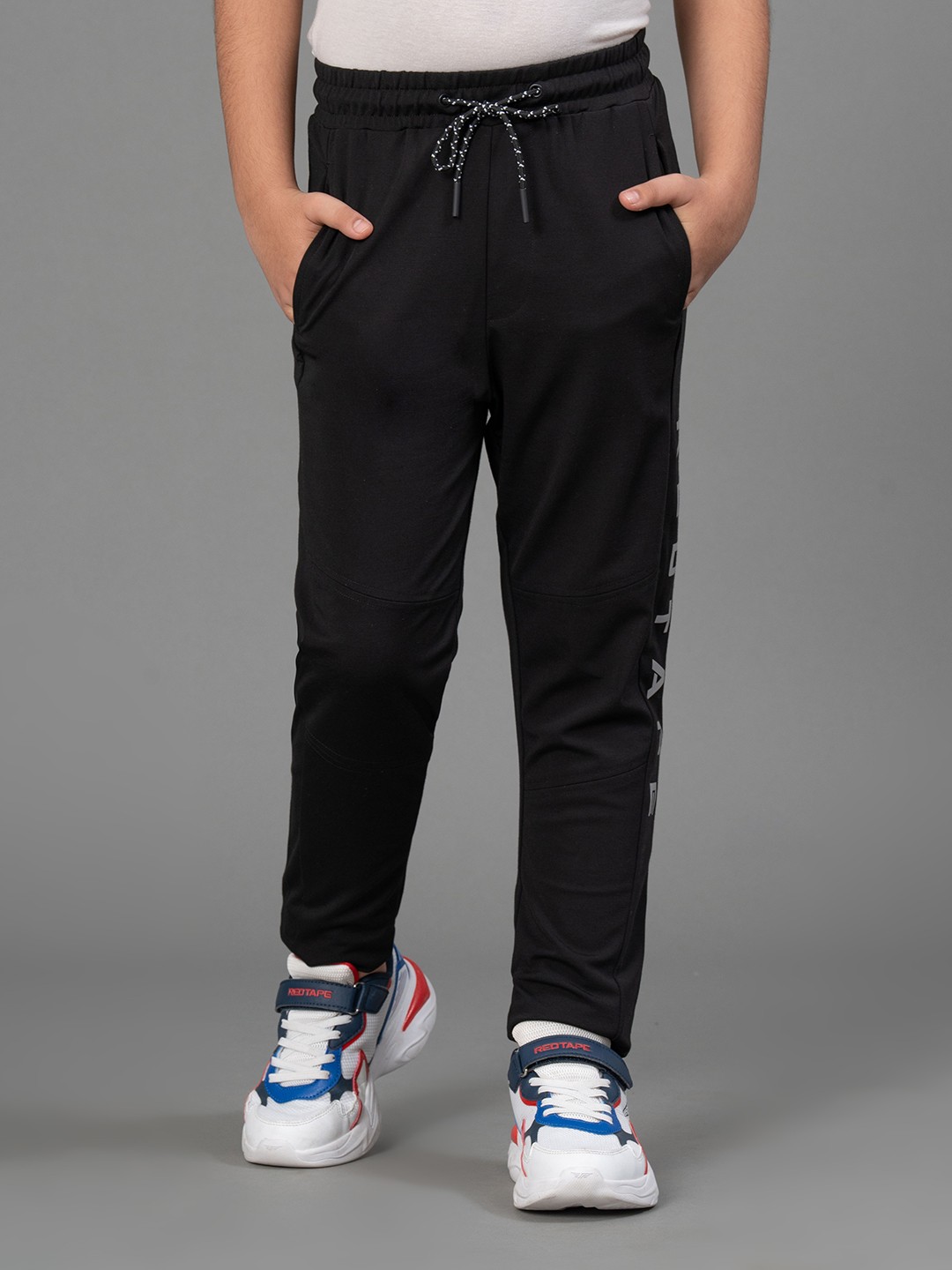 

Red Tape Boys Black Regular Fit Printed Regular Trousers