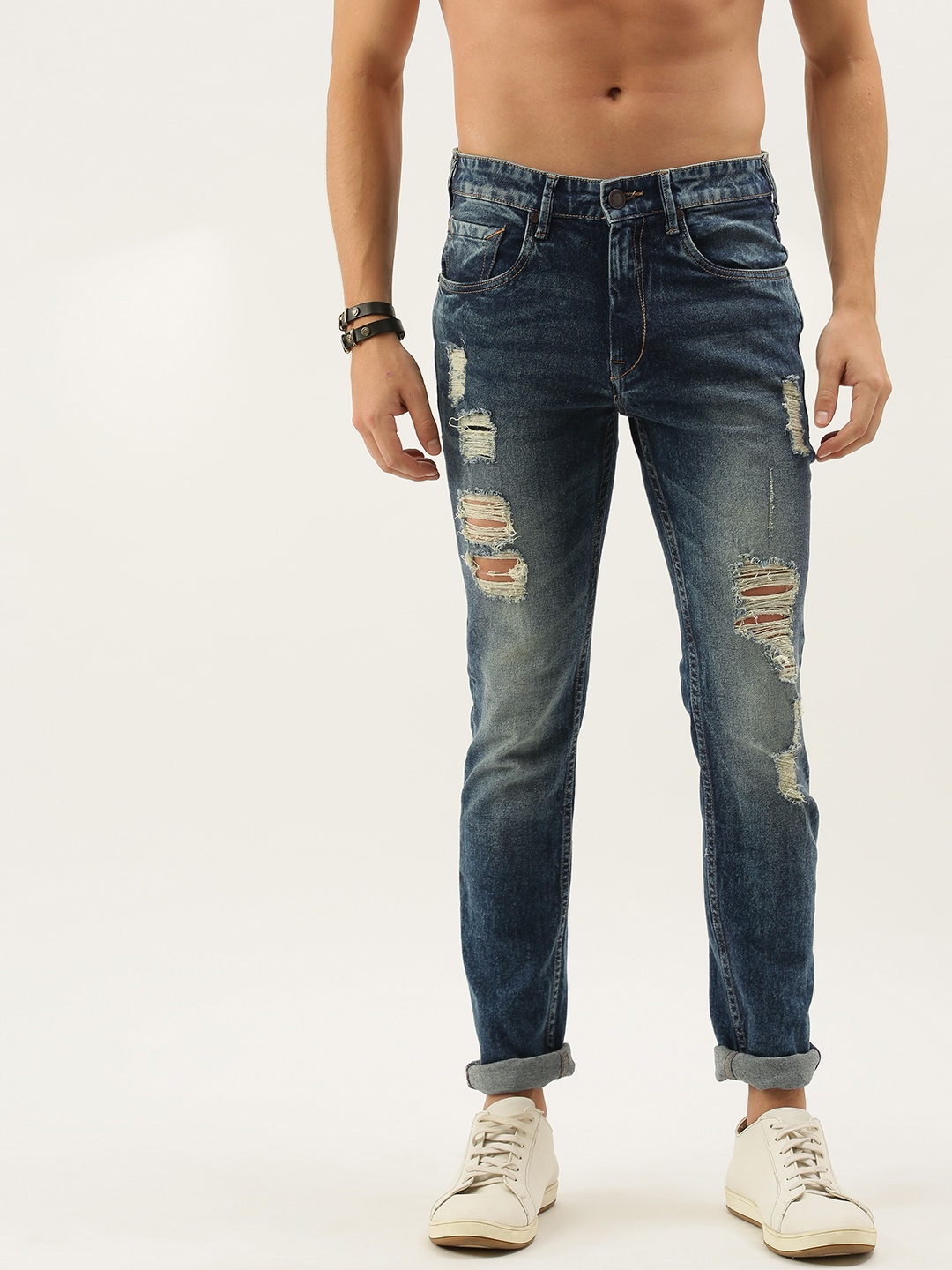 

Moda Rapido Men Blue Slim Fit Mid-Rise Highly Distressed Jeans