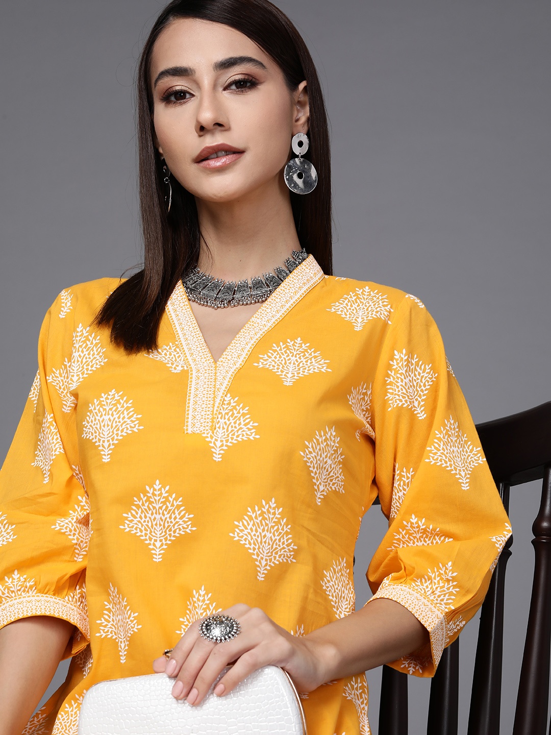 

Libas Women Yellow & White Floral Motifs Printed Kurta