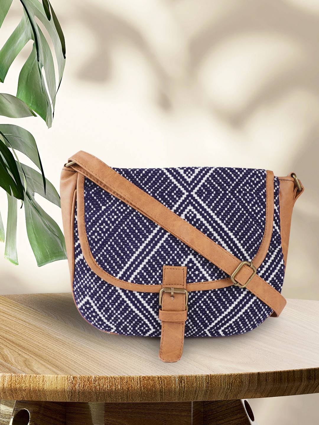 

Anouk Navy Blue & White Geometric Jacquard Self Design Sling Bag with Buckle Detail