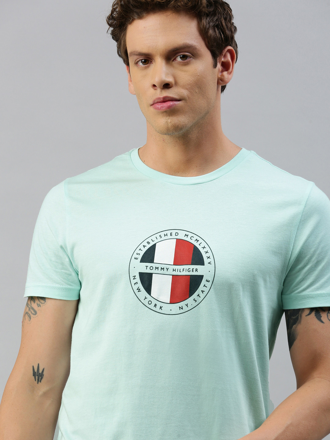 

Tommy Hilfiger Men Blue Printed Round Neck Pure Cotton T-shirt