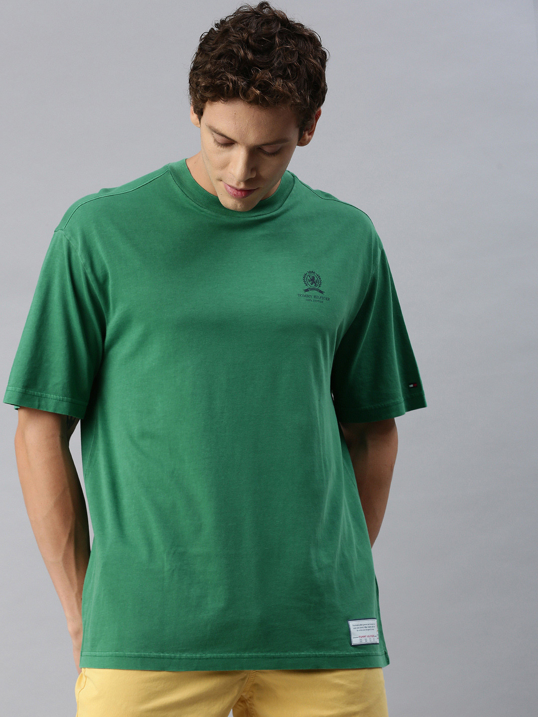 

Tommy Hilfiger Men Green Solid Polo Collar Pure Cotton T-shirt