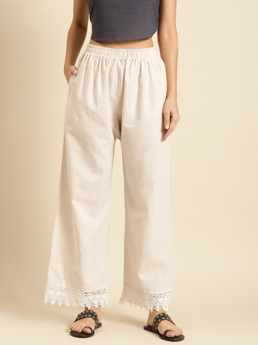 

TAG 7 Women Off-White Solid Hem Design Straight Palazzos
