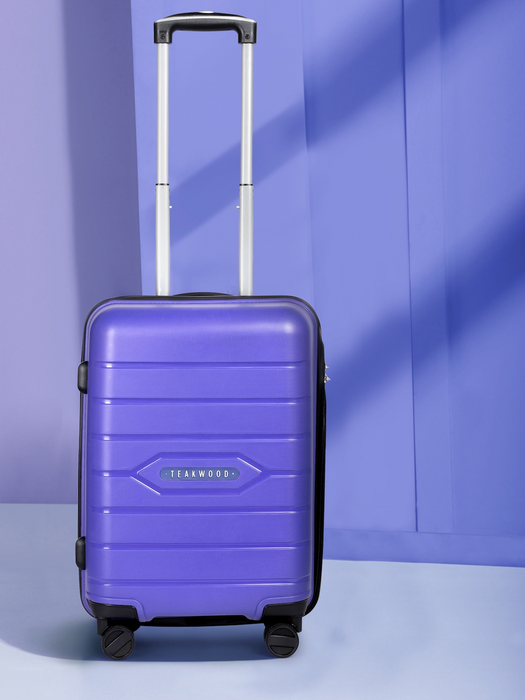 

Teakwood Leathers Vibes 360 Degree Rotation Hard Cabin-Sized Trolley Bag 30L, Blue