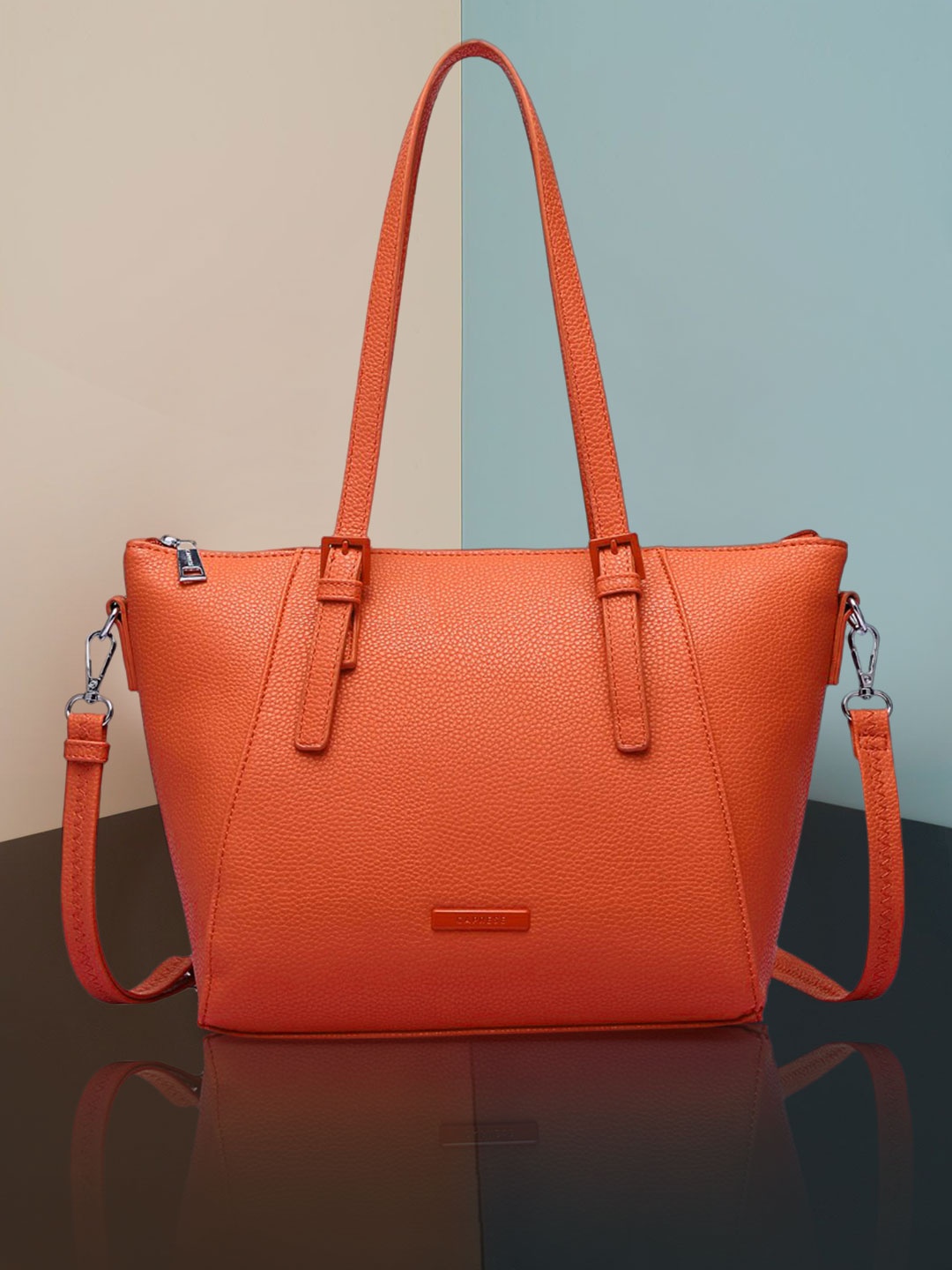 

Caprese Coral Orange PU Structured Sling Bag