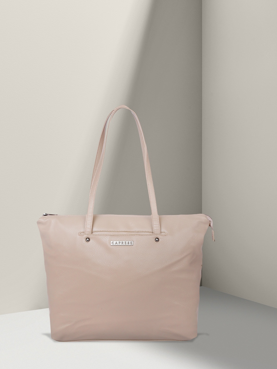 

Caprese Women Beige Solid Shoulder Bag