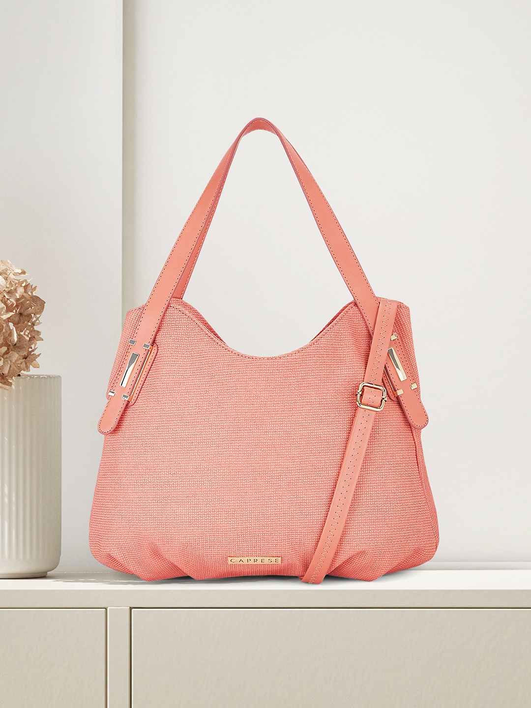 

Caprese Women Coral Solid Handheld Bag With Detachable Sling Strap