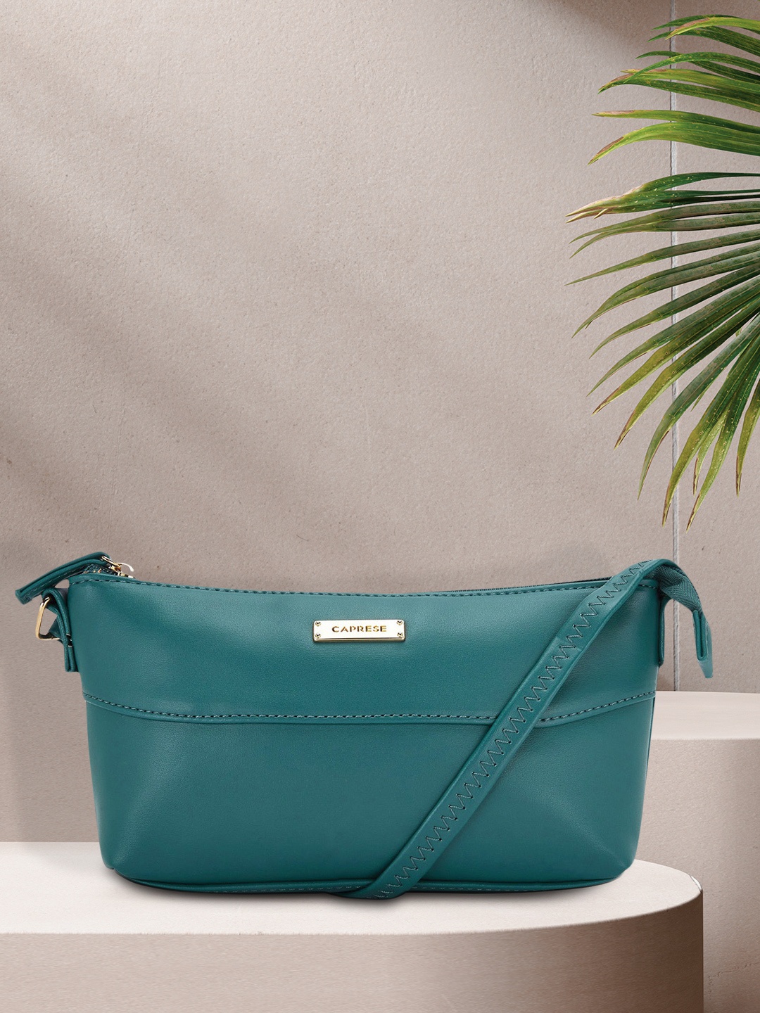 

Caprese Women Teal Solid Sling Bag