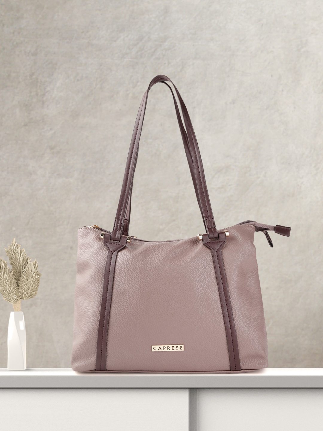 

Caprese Mauve Solid Shoulder Bag