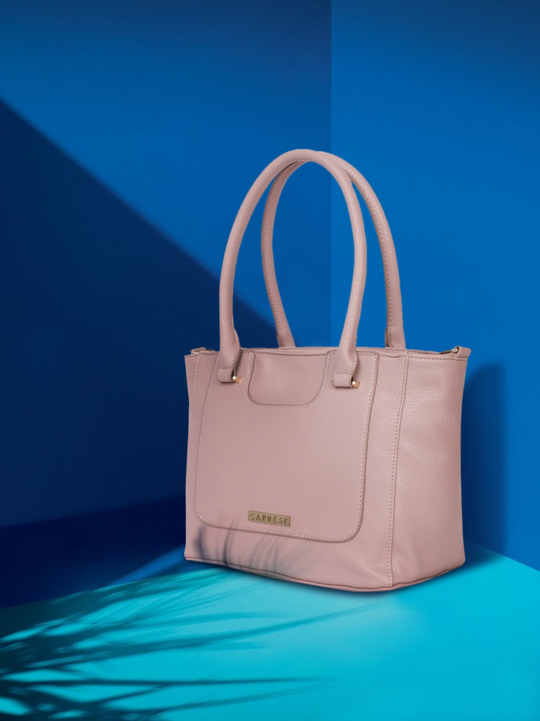 

Caprese Pink Solid Shoulder Bag