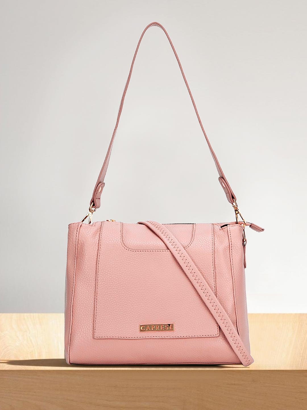 

Caprese Dusty Pink Solid Shoulder Bag