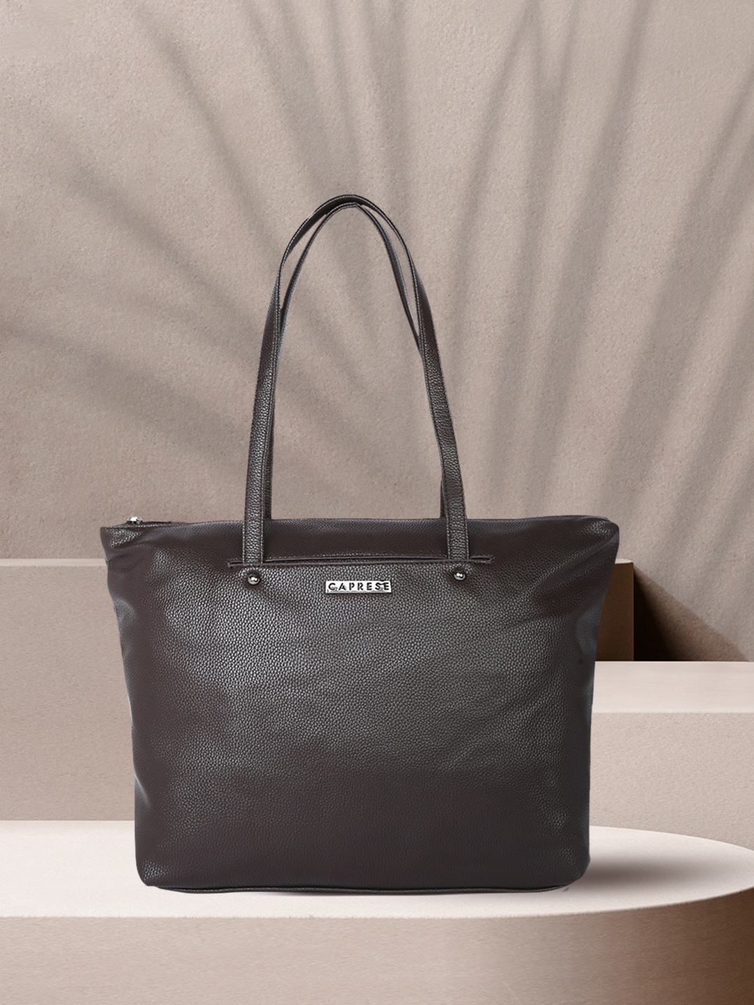 

Caprese Women Brown Solid Shoulder Bag