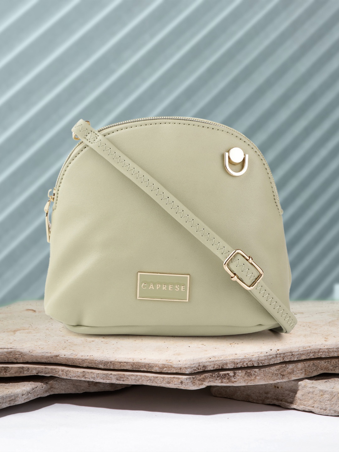 

Caprese Olive Green Solid Sling Bag with Detachable Sling Strap
