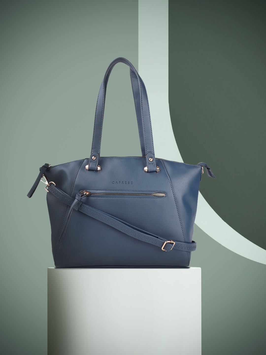 

Caprese Women Blue Solid Leather Shoulder Bag