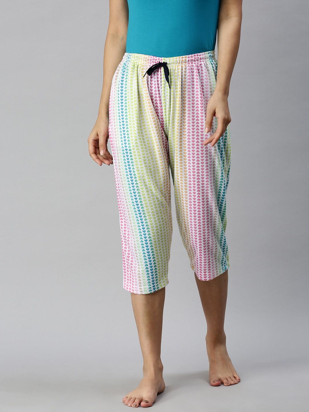 

Kryptic Women White & Pink Printed Regular Fit Capris