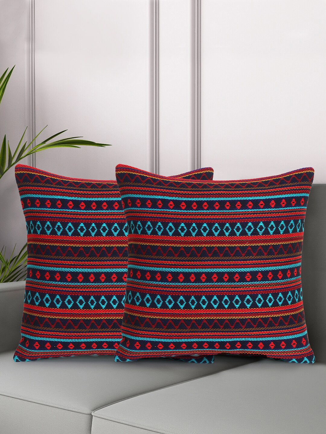 

Mezposh Navy Blue & Red Set of 2 Ethnic Motifs Square Cushion Covers