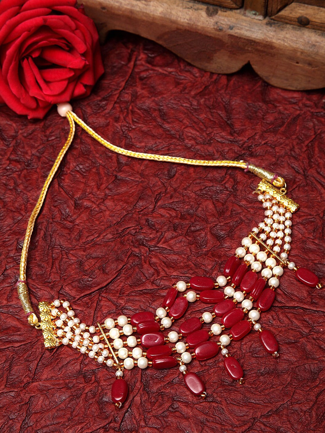 

Moedbuille Gold-Toned Red Beads and Pearls Studded Tasselled Handcrafted Tribal Choker