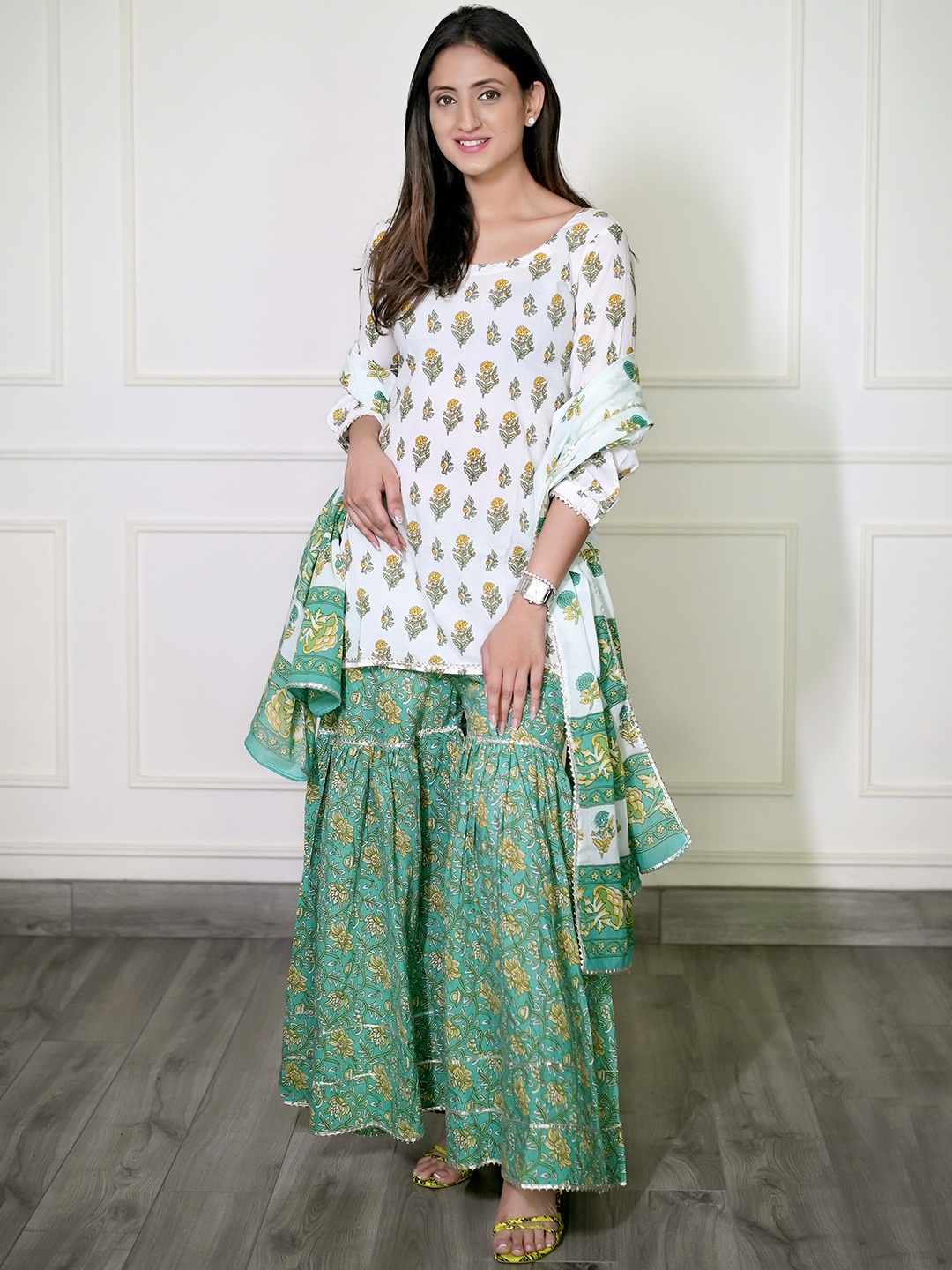 

Libas Women White Printed Kurti with Sharara & Dupatta