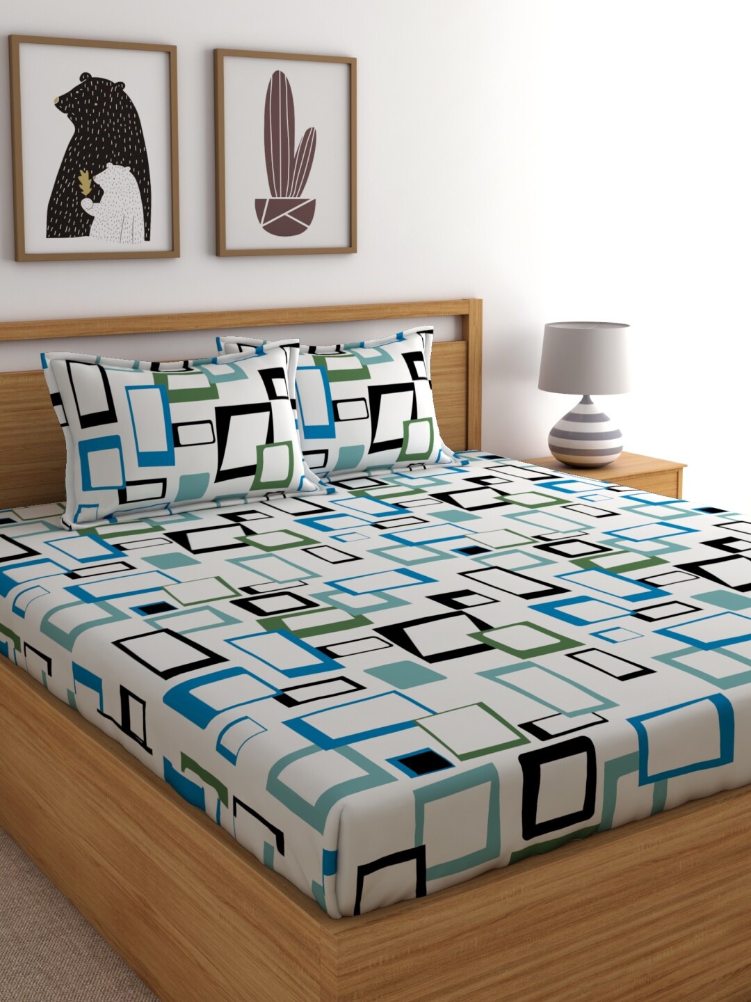 

Home Ecstasy White & Blue Geometric 140 TC Cotton 1 King Bedsheet with 2 Pillow Covers