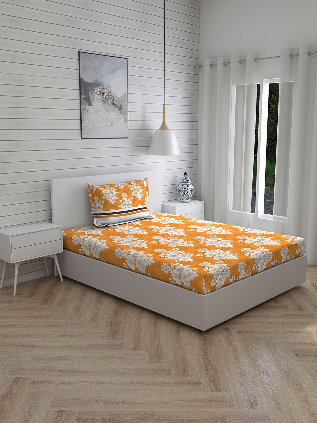 

Layers Orange & Off-White Floral 144 TC Cotton 1 Single Bedsheet with 1 Pillow Cover