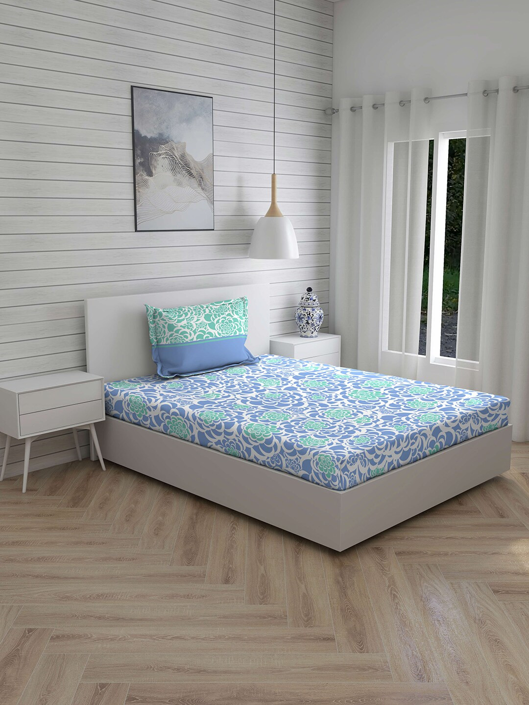 

Layers Blue & White Floral 144 TC Cotton 1 Single Bedsheet with 1 Pillow Covers