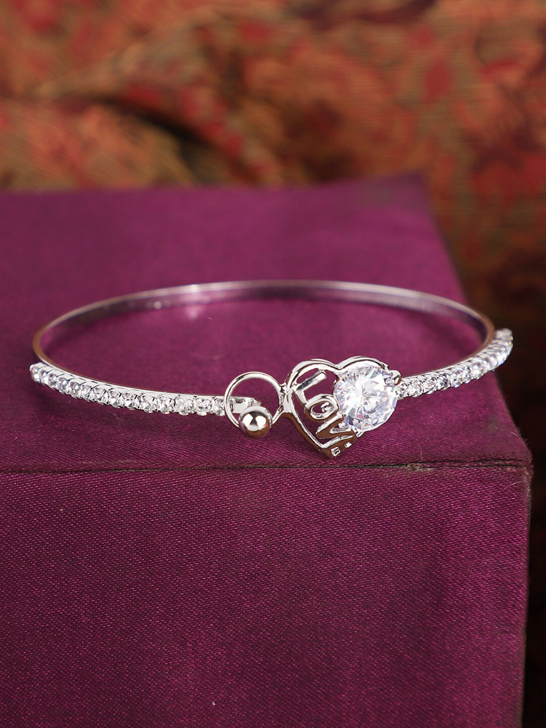 

ANIKAS CREATION Silver-Plated Handcrafted American Diamond Studded Bangle-Style Bracelet