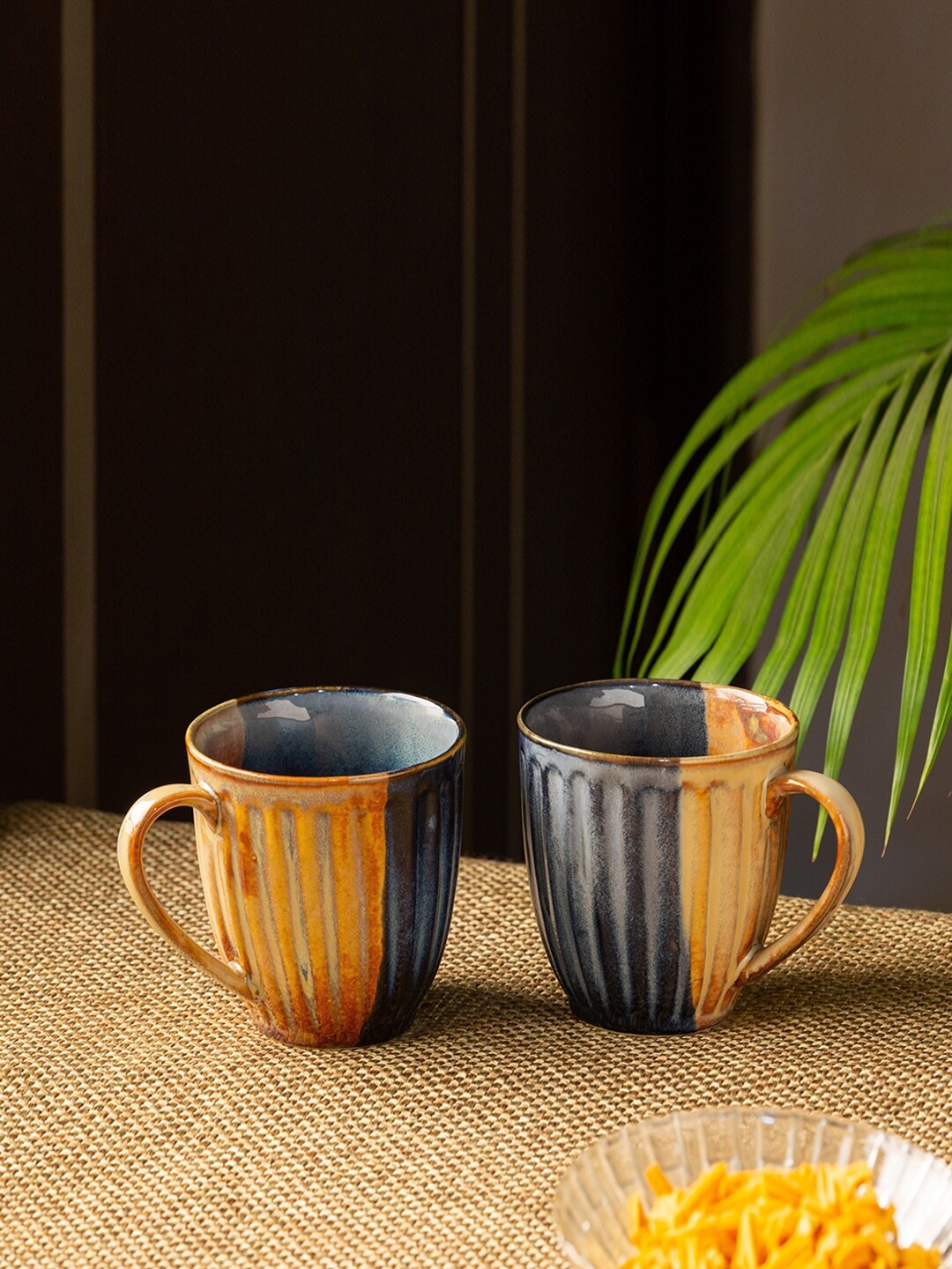 

ExclusiveLane Set of 2 Blue & Brown Textured Handcrafted Ceramic Coffee Mugs (300 ML)