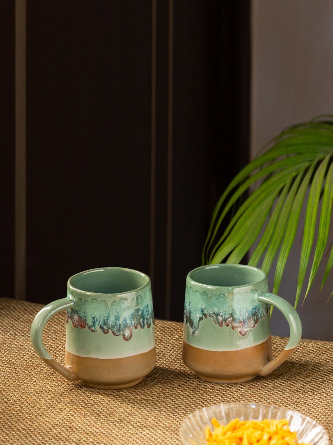 

ExclusiveLane Set of 2 Green Beige Printed Handcrafted Ceramic Coffee Mugs (280 ML)