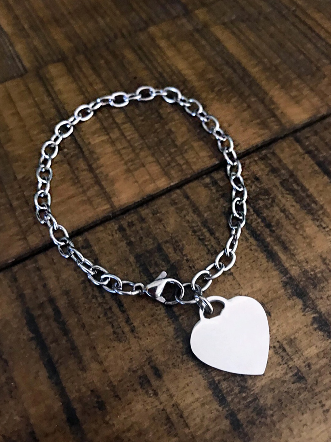

Yellow Chimes Woman Silver Plated Stainless Steel Chain Heart Charm Bracelet