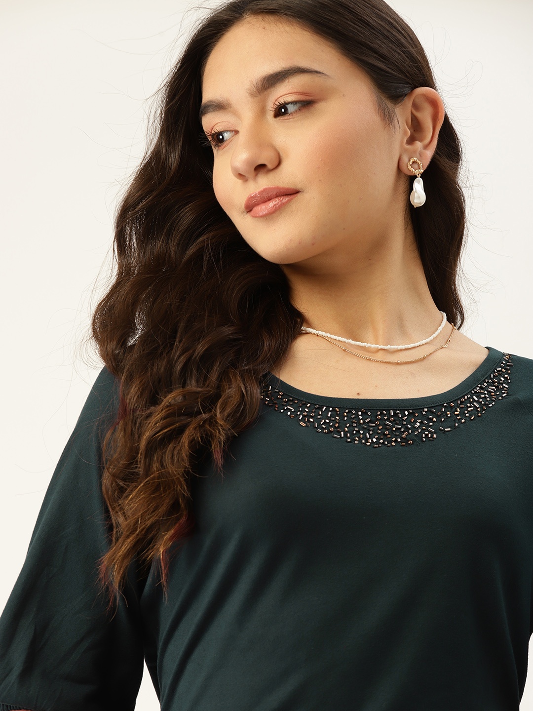 

DressBerry Green Solid Jewel Neck Top
