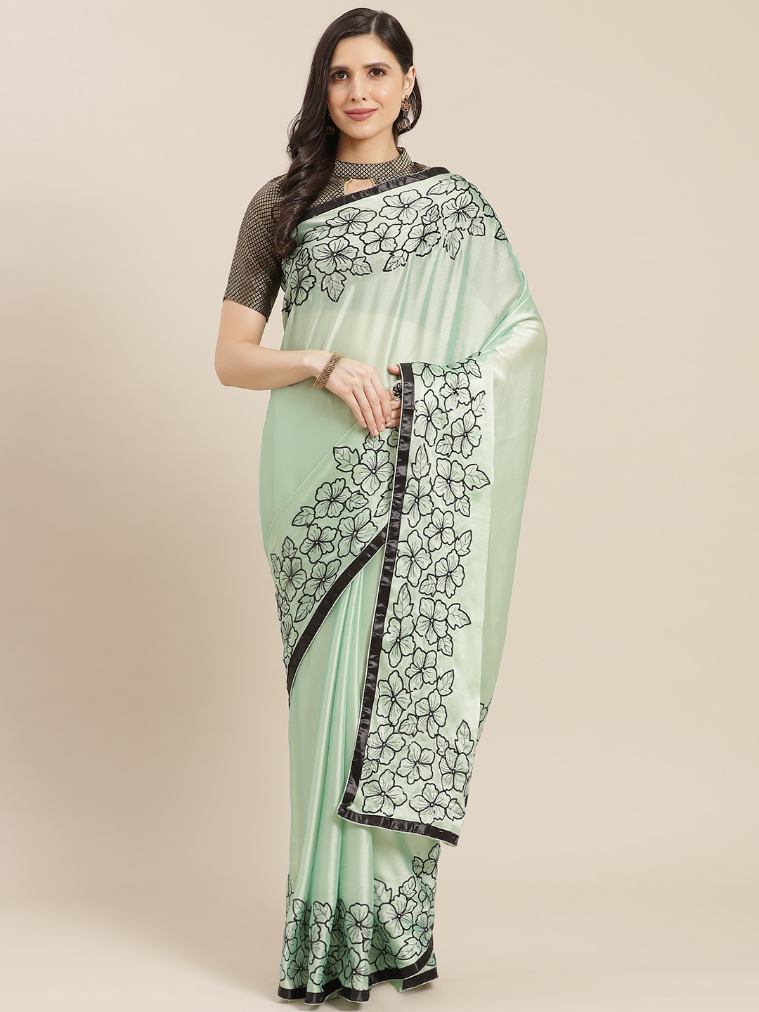 

Mitera Green & Black Sequinned Saree