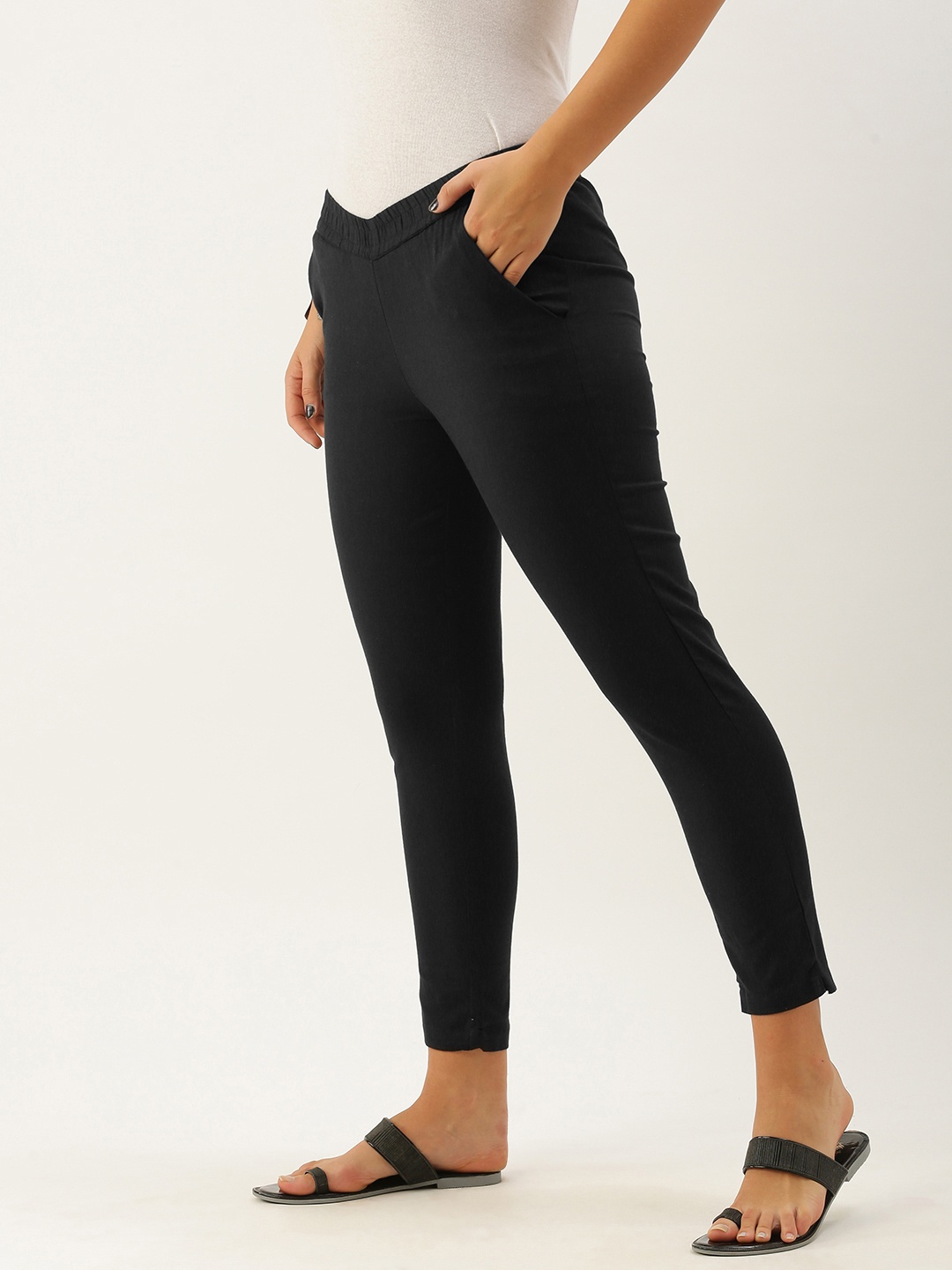 

AMUKTI Women Black Pleated Regular Trousers