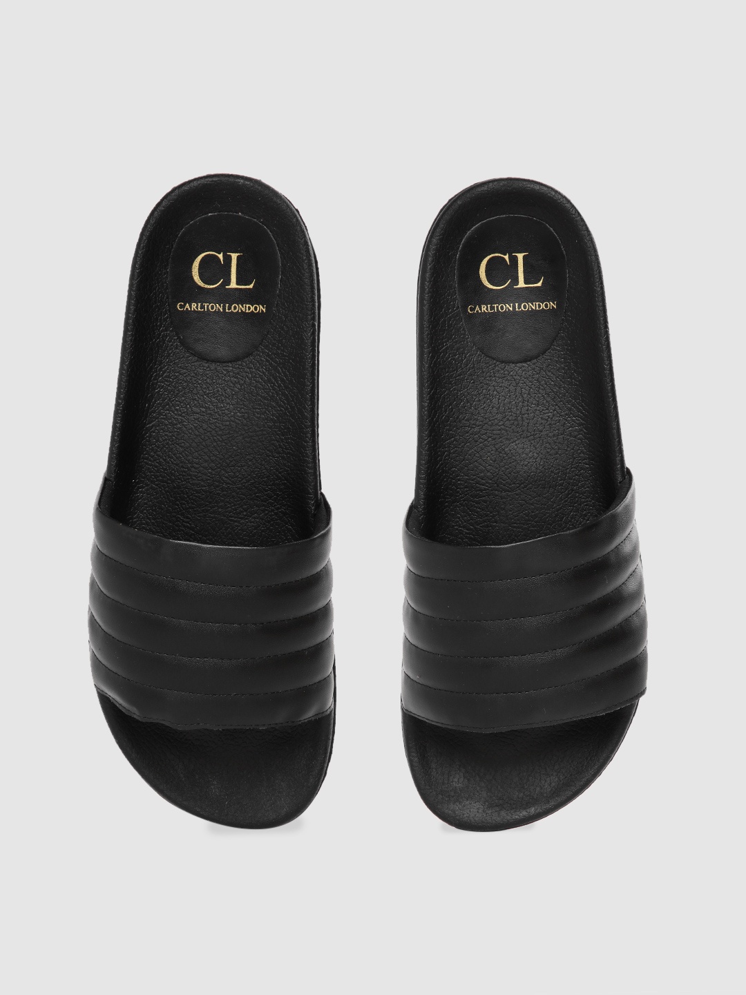 

Carlton London Women Black Self Striped Sliders