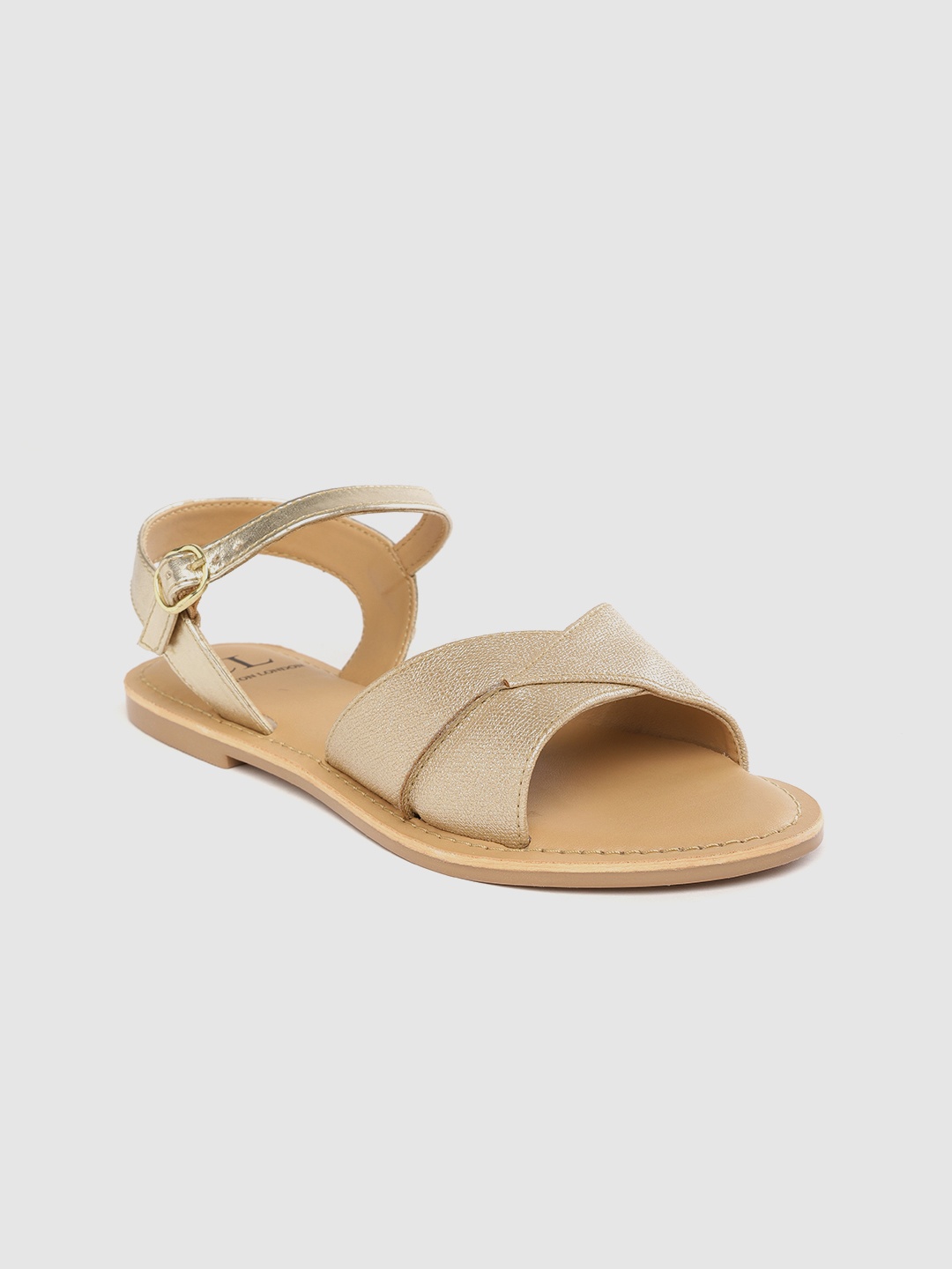 

Carlton London Women Muted Gold-Toned Criss Cross Solid Open Toe Flats