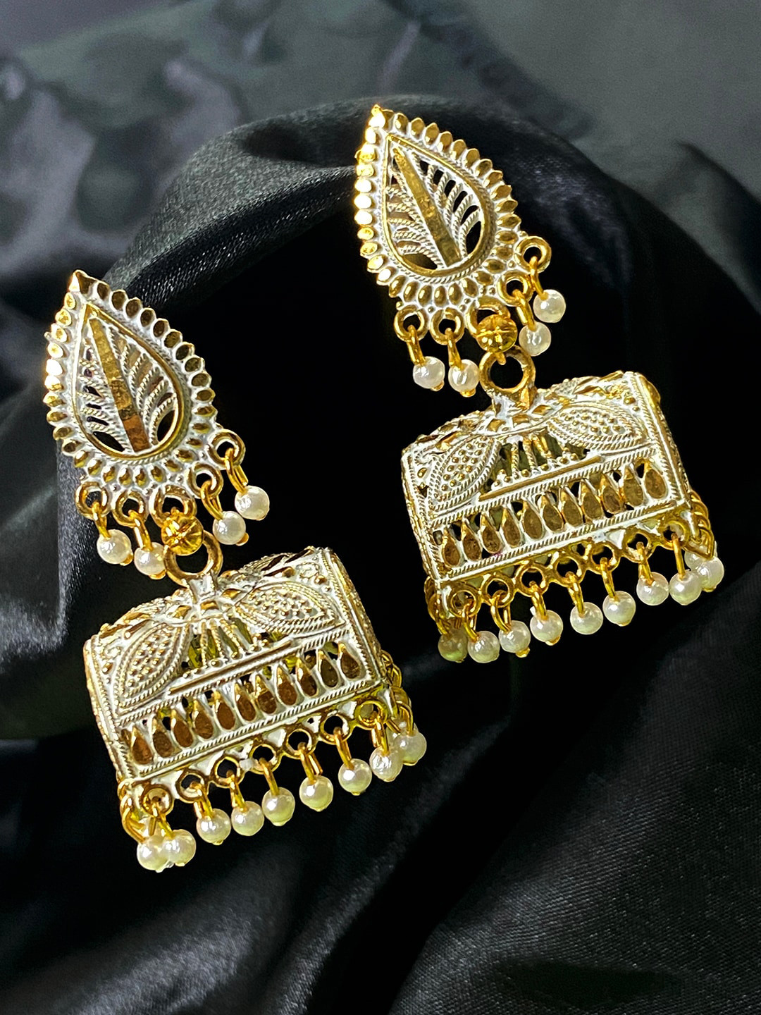 

ANIKAS CREATION Gold-Plated & White Contemporary Jhumkas
