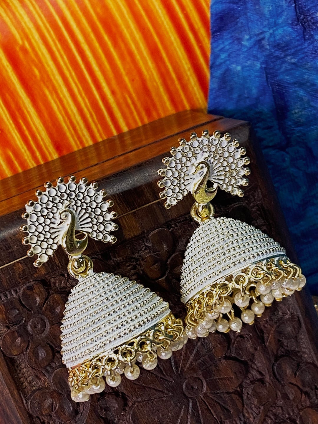 

ANIKAS CREATION White Gold-Plated Dome Shaped Jhumkas