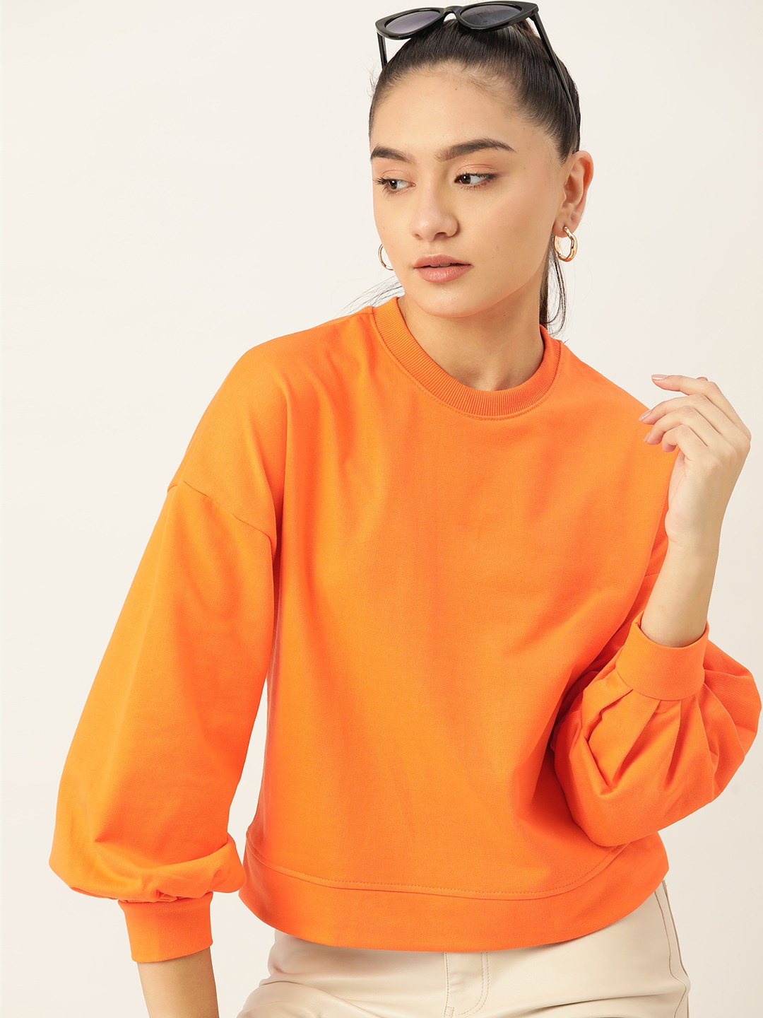

DressBerry Women Orange Solid Sweatshirt
