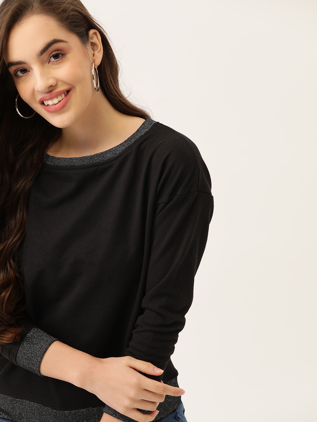 

DressBerry Women Black Solid Sweatshirt