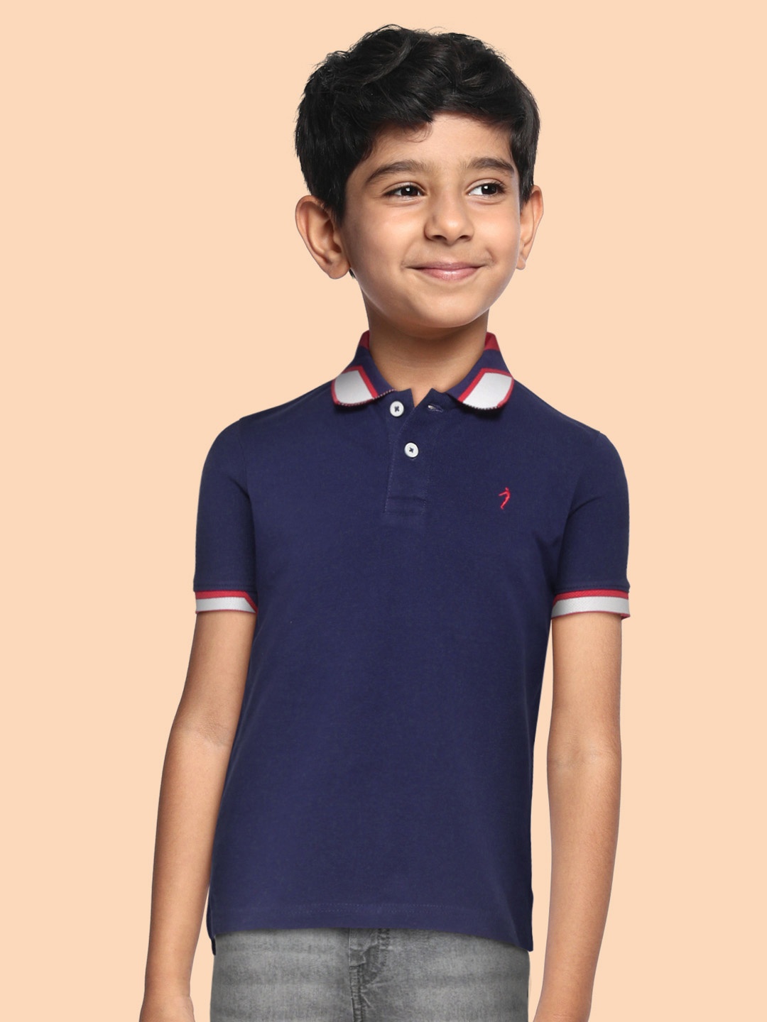 

Indian Terrain Boys Navy Blue & White Solid Polo Collar Pure Cotton T-shirt