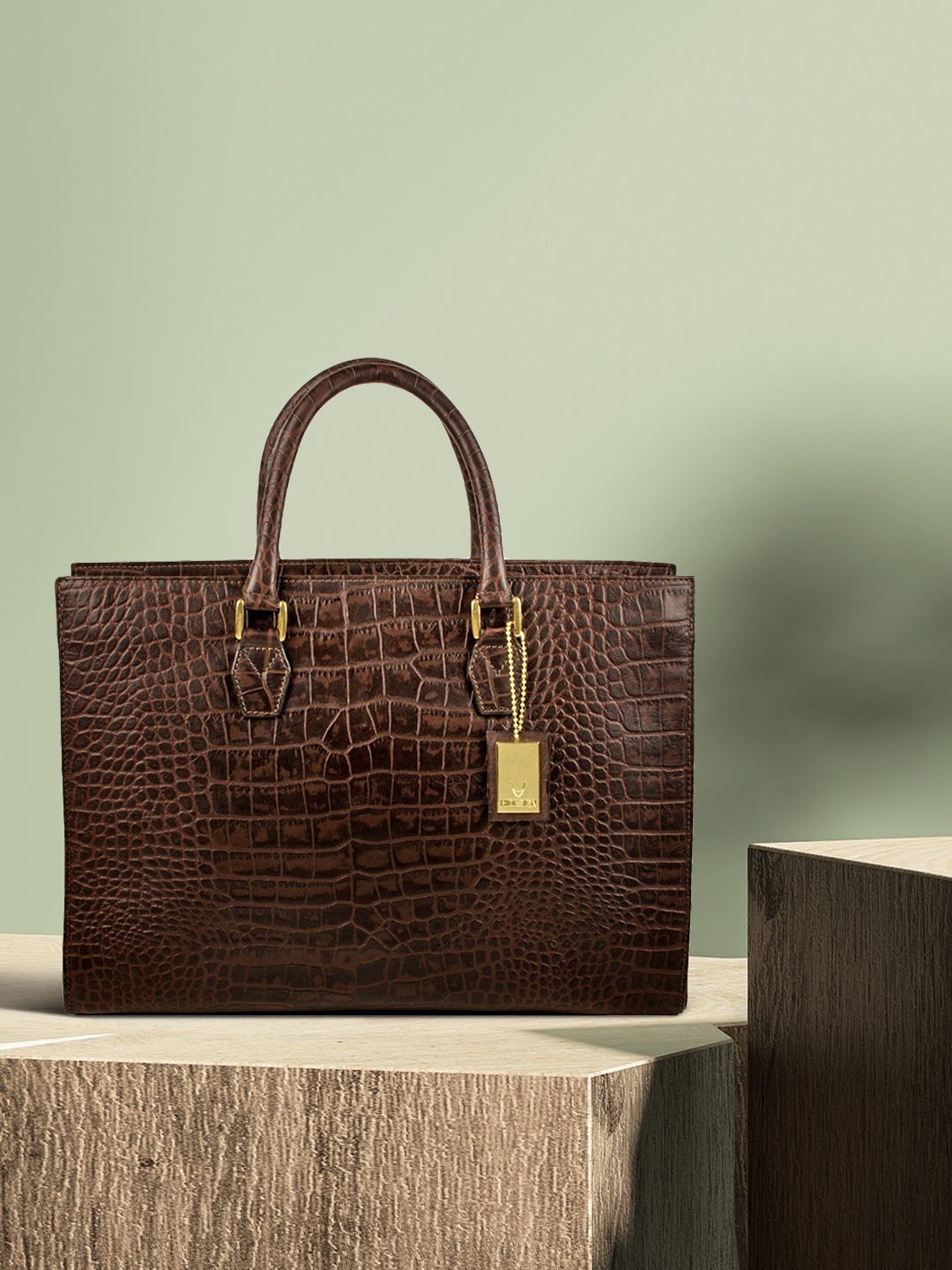 

Hidesign Brown Textured Handheld Bag