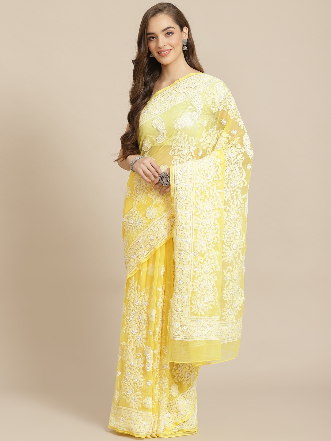 

ADA Women Yellow & White Poly Georgette Chikankari Embroidered Handloom Saree