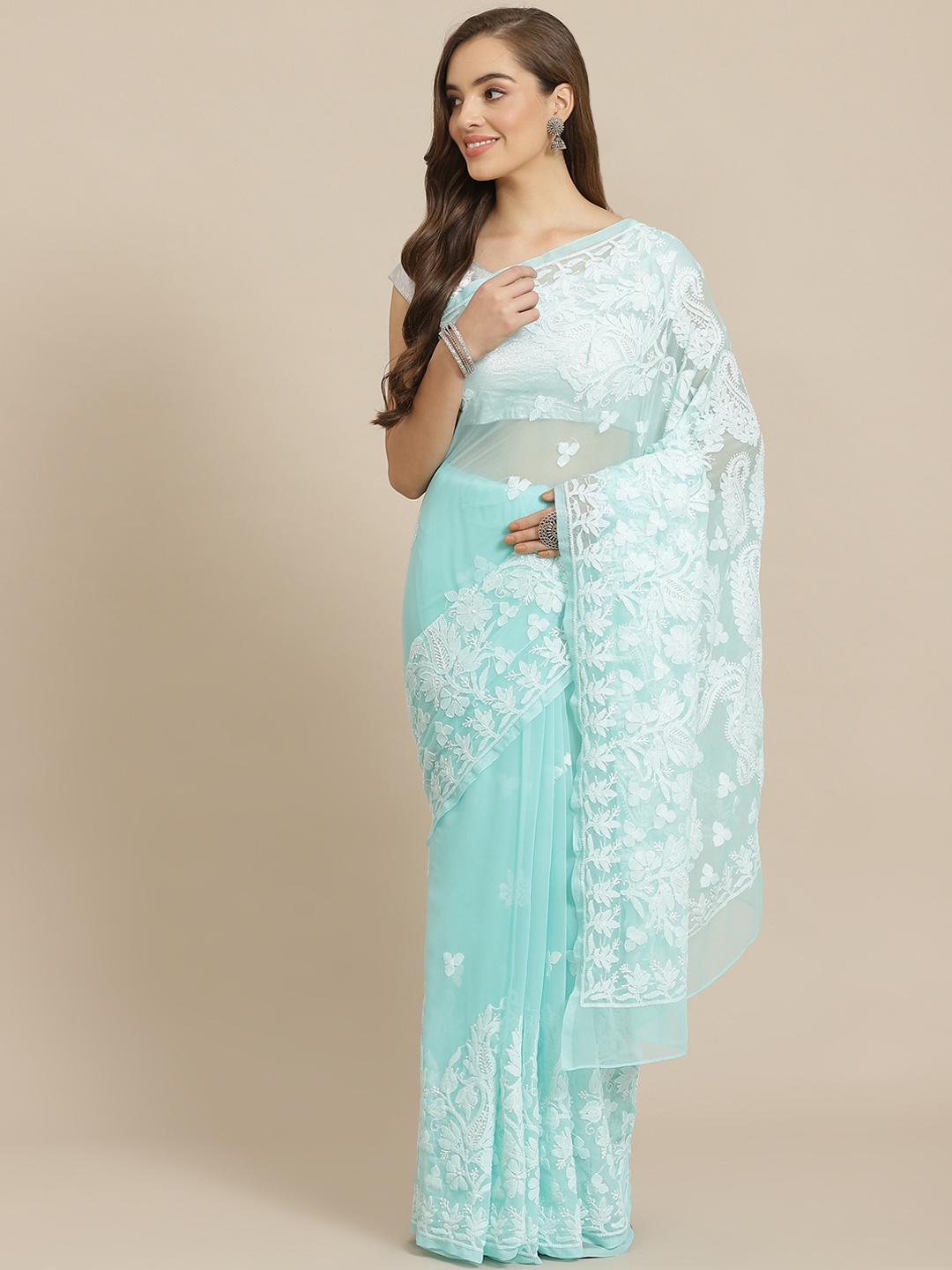 

ADA Women Sea Green & White Poly Georgette Chikankari Embroidered Handloom Saree