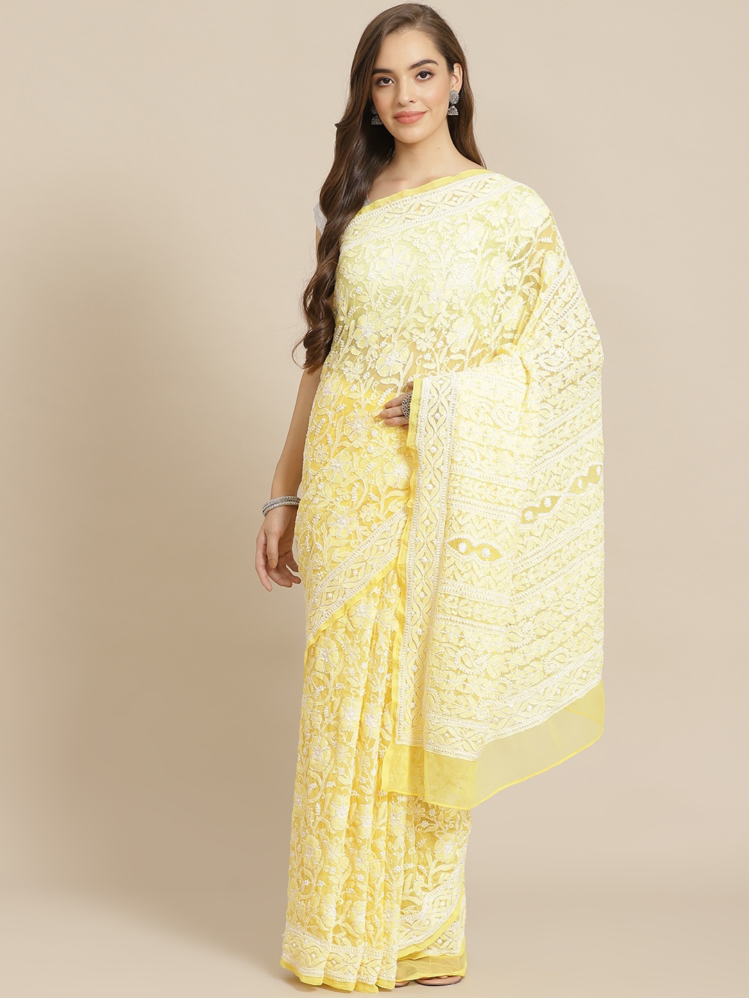 

ADA Women Yellow & White Poly Georgette Chikankari Embroidered Handloom Saree