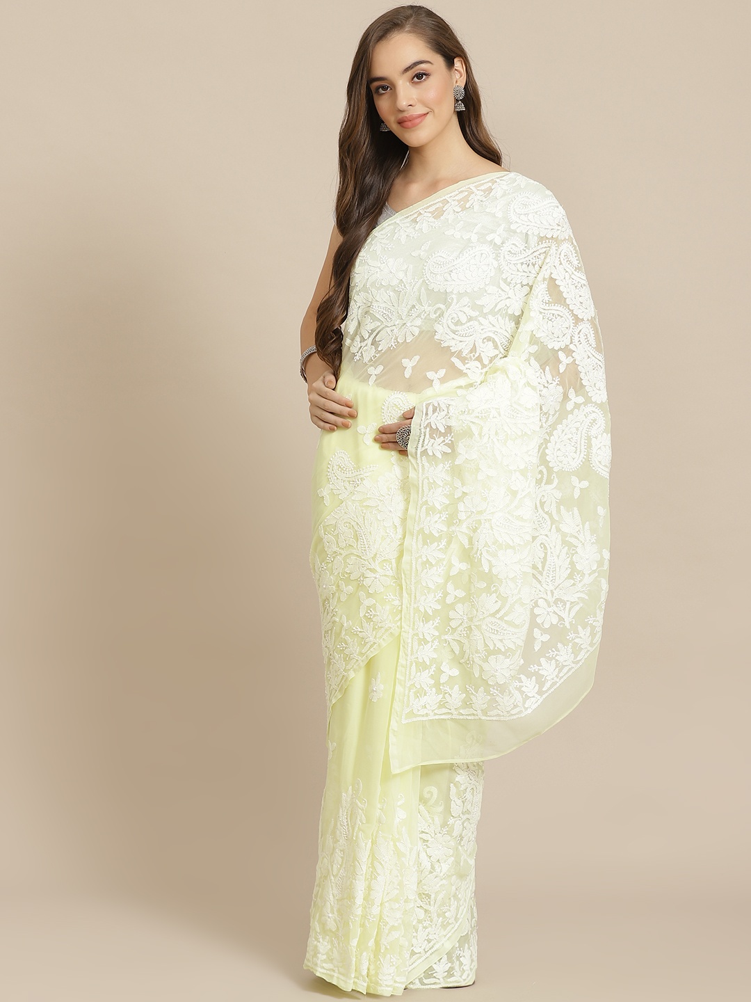 

ADA Women Yellow & White Poly Georgette Chikankari Embroidered Saree