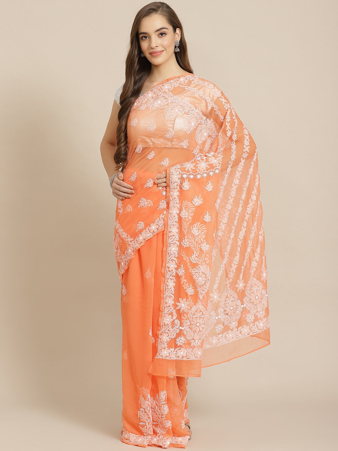 

ADA Women Orange & White Poly Georgette Chikankari Embroidered Handloom Saree