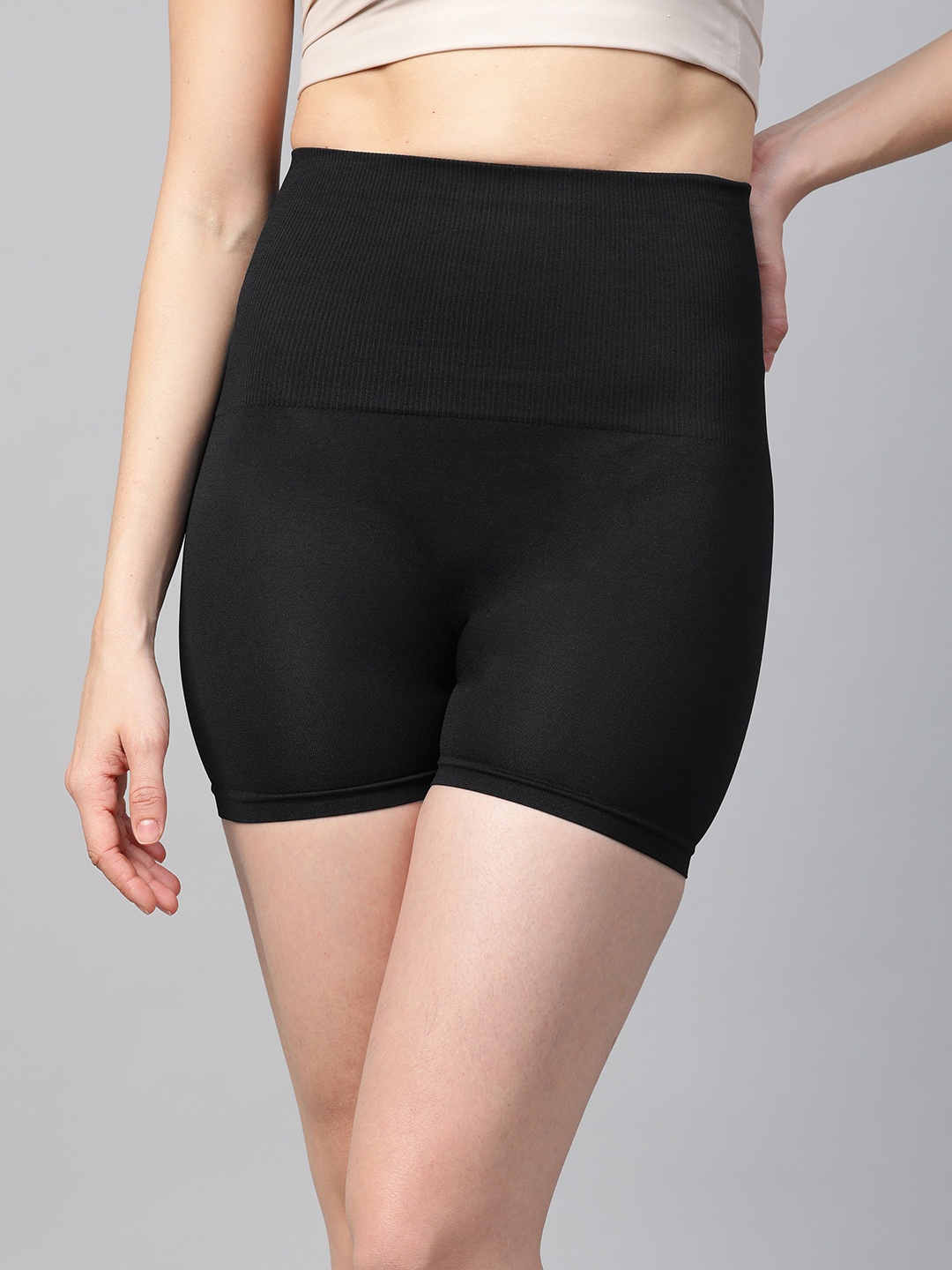 

Inddus Women Black Solid High Compressed Seamless Tummy Thigh Shapewear